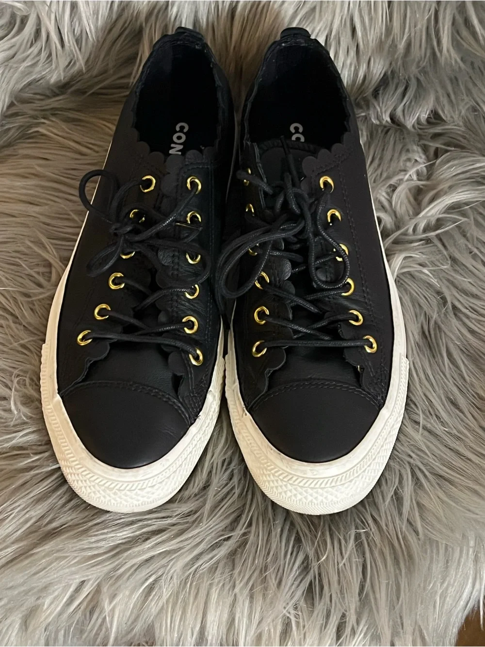 Converse Black Leather Low-Top Sneakers with Gold Eyelets and White Sole